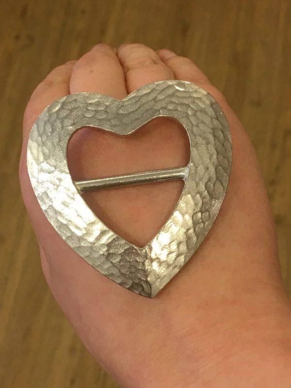 hammered heart scarf ring on hand