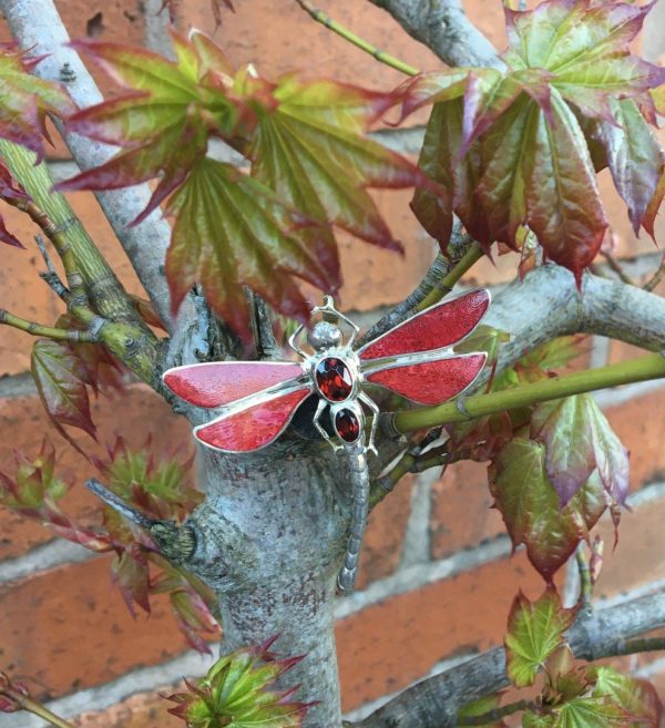 red dragonfly brooch on branch